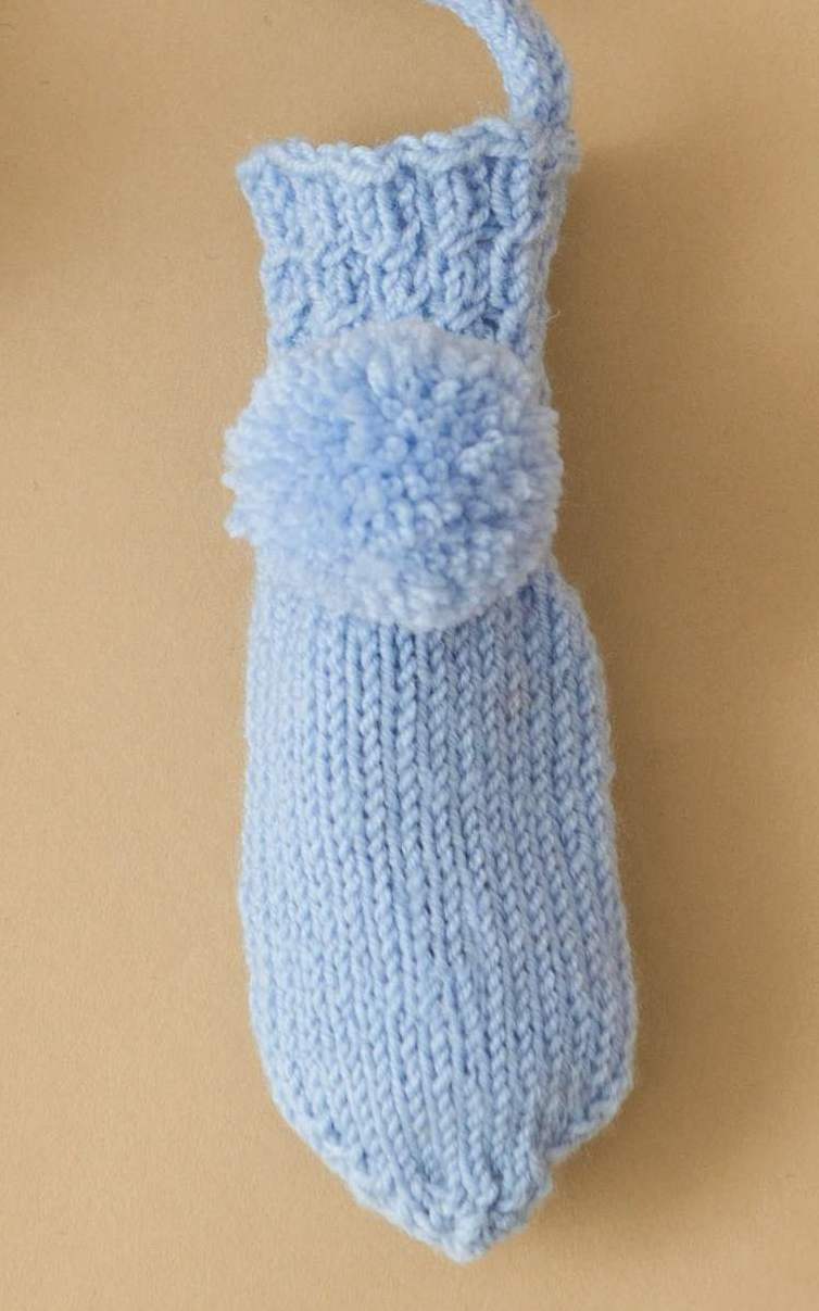 Baby Fäustlinge mit Bommeln - Strickset von LANA GROSSA jetzt online kaufen bei OONIQUE